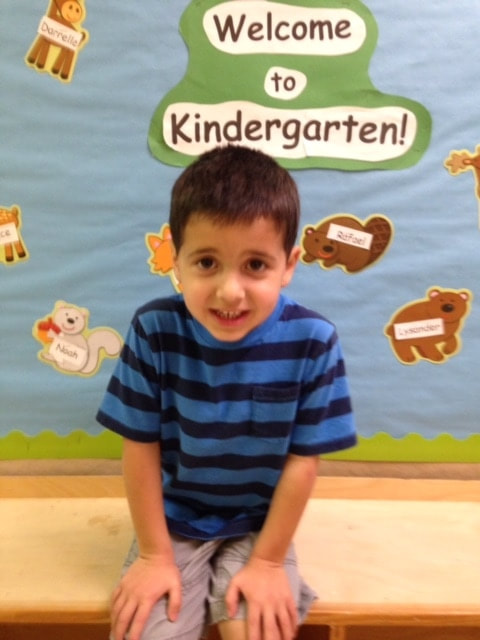 Picture of pre-k teaching working with student